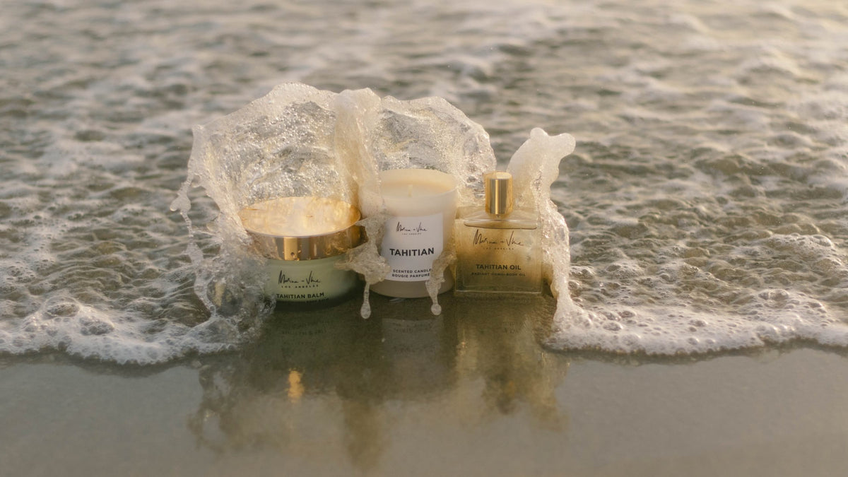 Tahitian Balm, Tahitian Candle and Tahitian Oil caught in a breaking wave